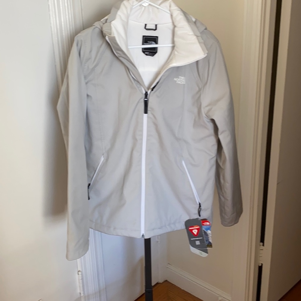 Light grey North Face ski jacket